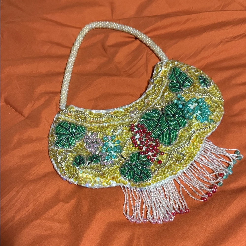Elegant Beaded Yellow Clutch with Floral Accents